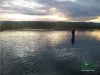 Computer screen wallpaper: Asger fighting an Icelandic trout